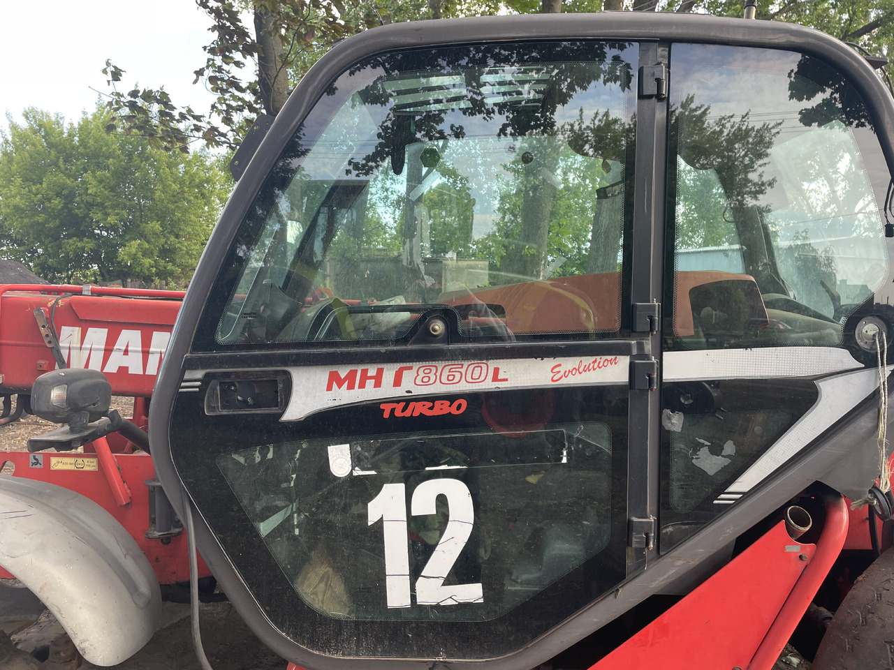 Manitou MHT 860 - części - błotniki drzwi kabina - Puerta y piezas para Maquinaria agrícola: foto 1 Manitou MHT 860 - części - błotniki drzwi kabina - Puerta y piezas para Maquinaria agrícola: foto 1