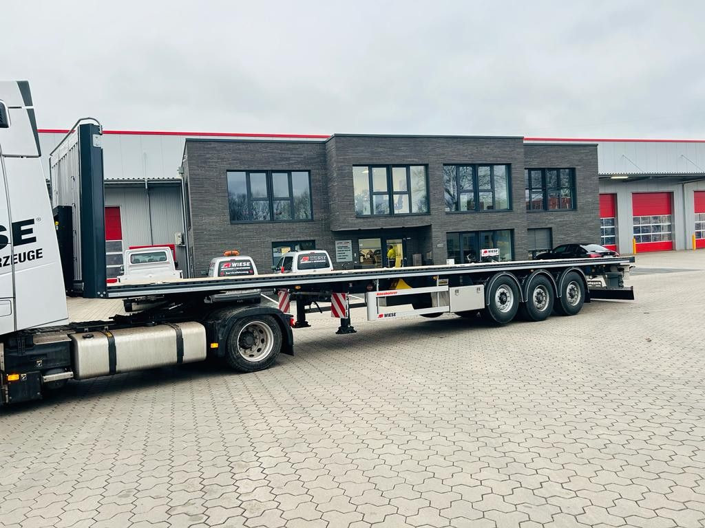 Kässbohrer K.SPS Plattform Auflieger Sofort Verfügbar - Semirremolque plataforma/ Caja abierta: foto 1 Kässbohrer K.SPS Plattform Auflieger Sofort Verfügbar - Semirremolque plataforma/ Caja abierta: foto 1