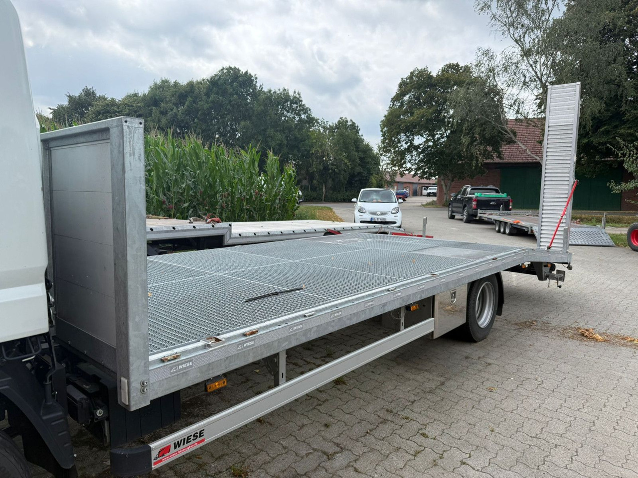 Mitsubishi Fuso Canter 7C18 Arbeitsbühnentransporter - Grua de remolque autos: foto 5 Mitsubishi Fuso Canter 7C18 Arbeitsbühnentransporter - Grua de remolque autos: foto 5