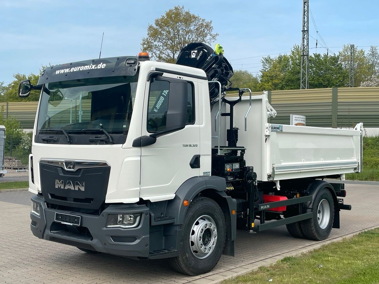 MAN TGM 18.320 4x2 Euro6e Hiab X-HiDuo138DS-3Euromix - Camión volquete, Camión grúa: foto 2 MAN TGM 18.320 4x2 Euro6e Hiab X-HiDuo138DS-3Euromix - Camión volquete, Camión grúa: foto 2