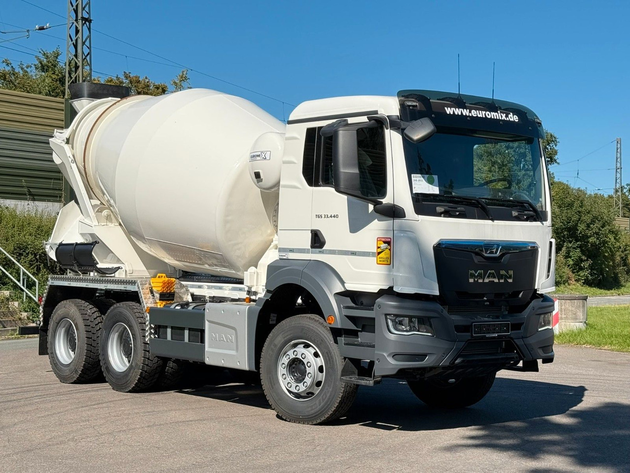 MAN TGS 33.440 / 6X4 Euro6e Euromix MTP EM 7 L - Camión hormigonera: foto 1 MAN TGS 33.440 / 6X4 Euro6e Euromix MTP EM 7 L - Camión hormigonera: foto 1