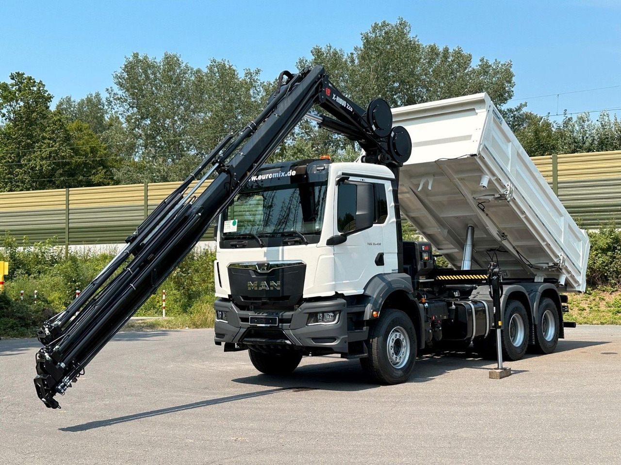 MAN TGS 33.440 6x4 /3-Seiten- Kipper / HIAB 228-6 - Camión volquete, Camión grúa: foto 3 MAN TGS 33.440 6x4 /3-Seiten- Kipper / HIAB 228-6 - Camión volquete, Camión grúa: foto 3