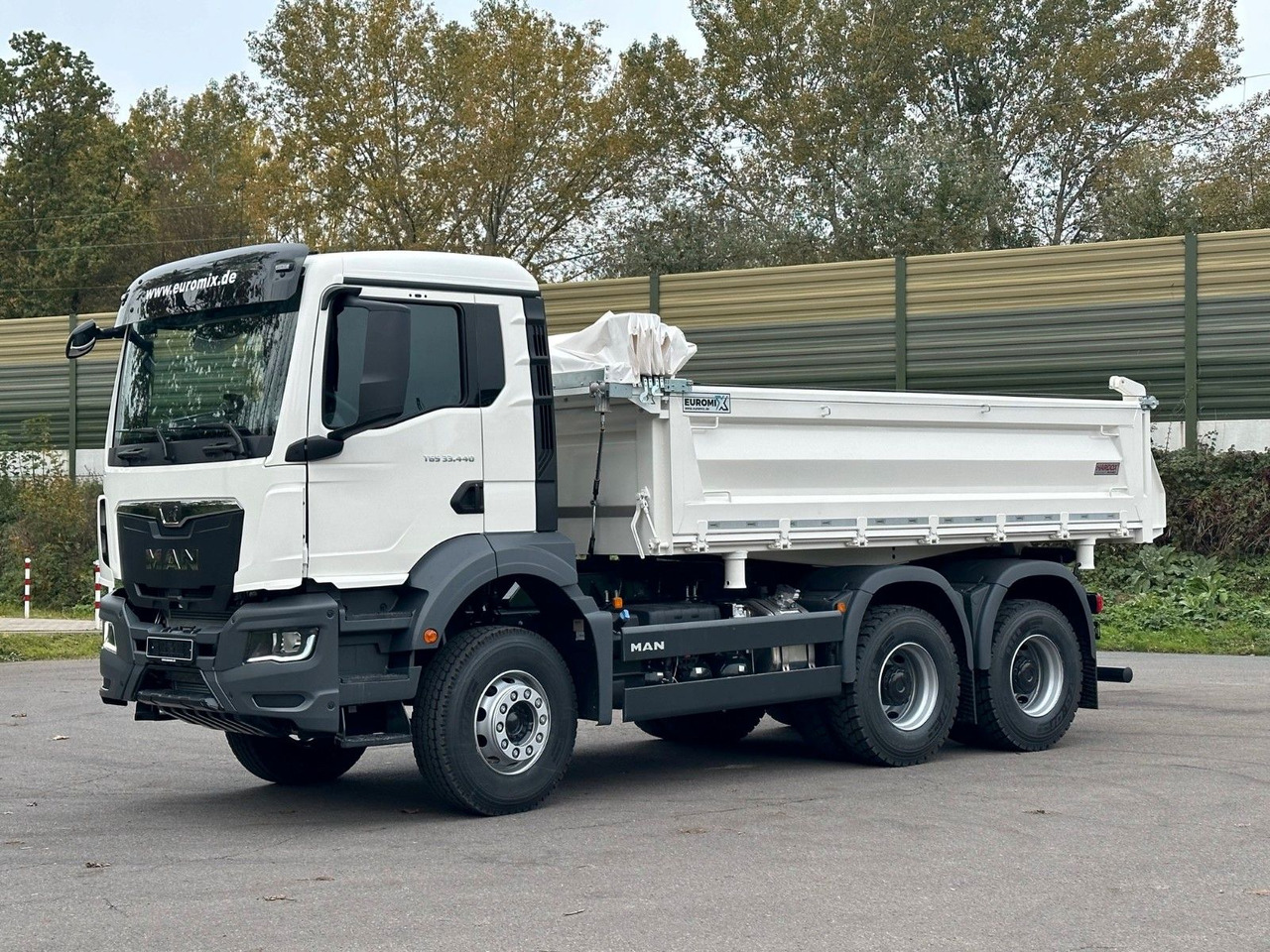 MAN TGS 33.440 6x4 /Euro6 3-Seiten-Kipper EuromixMTP - Camión volquete: foto 1 MAN TGS 33.440 6x4 /Euro6 3-Seiten-Kipper EuromixMTP - Camión volquete: foto 1