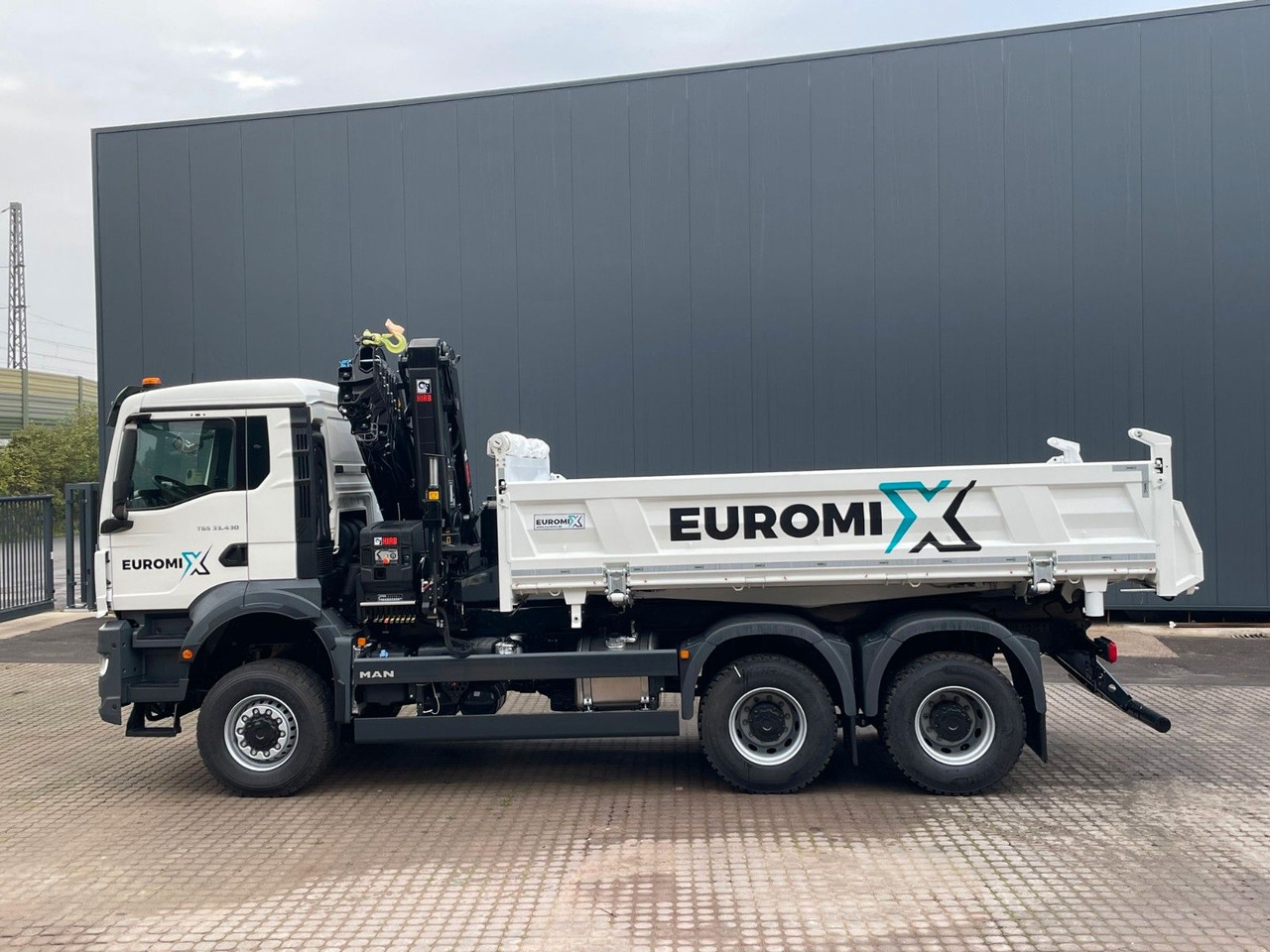MAN TGS 33.440 6x6 /3-Seiten- Kipper / HIAB 228-6 - Camión volquete, Camión grúa: foto 2 MAN TGS 33.440 6x6 /3-Seiten- Kipper / HIAB 228-6 - Camión volquete, Camión grúa: foto 2