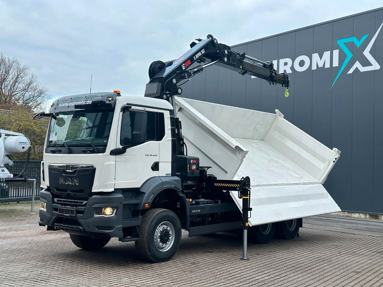 MAN TGS 33.440 6x6 /3-Seiten- Kipper / Kran HIAB 302 - Camión volquete, Camión grúa: foto 5 MAN TGS 33.440 6x6 /3-Seiten- Kipper / Kran HIAB 302 - Camión volquete, Camión grúa: foto 5
