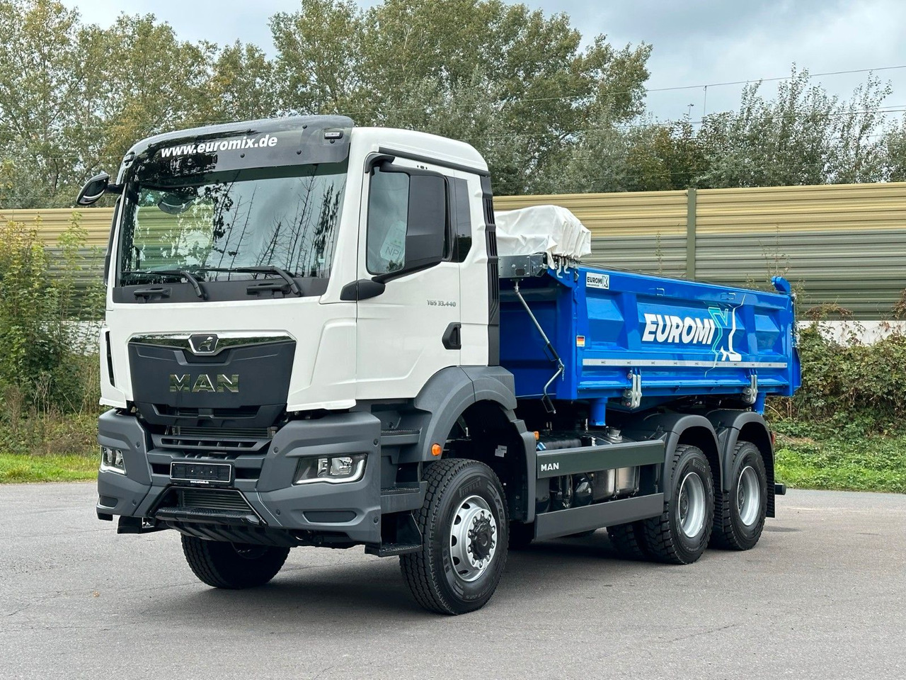 MAN TGS 33.440 6x6 /Euro6 3-Seiten-Kipper EuromixMTP - Camión volquete: foto 1 MAN TGS 33.440 6x6 /Euro6 3-Seiten-Kipper EuromixMTP - Camión volquete: foto 1