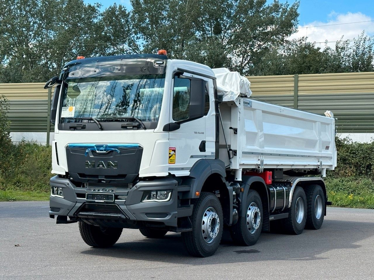 MAN TGS 41.440 8x4 EuromixMTP 3-Seiten-Kipper - Camión volquete: foto 1 MAN TGS 41.440 8x4 EuromixMTP 3-Seiten-Kipper - Camión volquete: foto 1