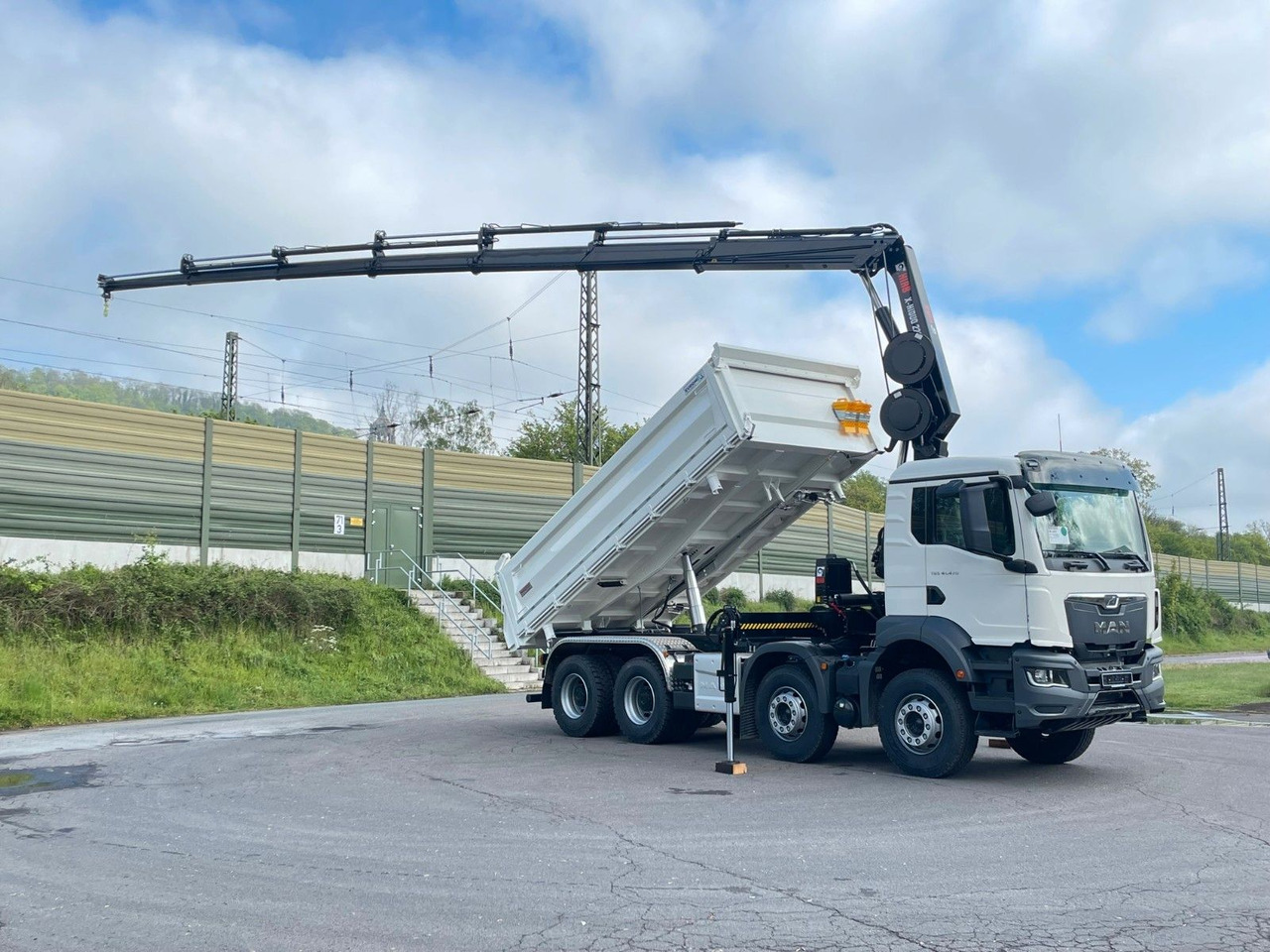 MAN TGS 41.480 8x4/Euro6e Euromix Kipper Hiab 228-6 - Camión volquete, Camión grúa: foto 1 MAN TGS 41.480 8x4/Euro6e Euromix Kipper Hiab 228-6 - Camión volquete, Camión grúa: foto 1