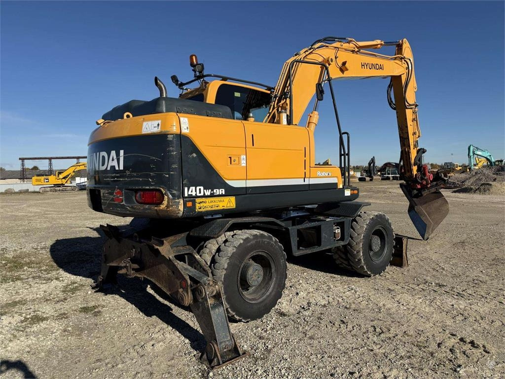 Hyundai Robex 140 W-9A Rototilt + grap - Excavadora de ruedas: foto 4 Hyundai Robex 140 W-9A Rototilt + grap - Excavadora de ruedas: foto 4