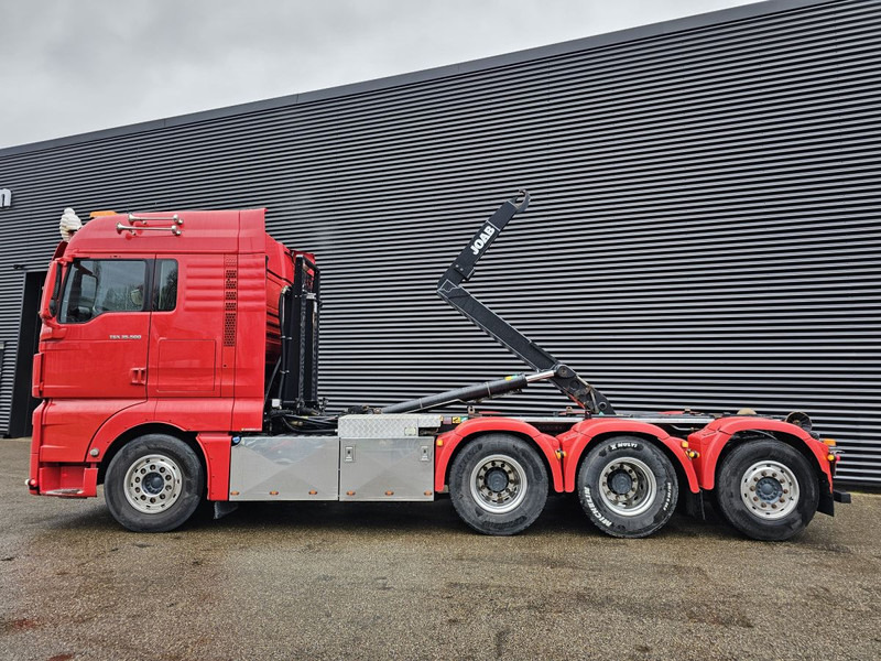 MAN TGX 35.500 / 8x4-4 / ABROLL-KIPPER / HOOKLIFT - Camión multibasculante: foto 2 MAN TGX 35.500 / 8x4-4 / ABROLL-KIPPER / HOOKLIFT - Camión multibasculante: foto 2