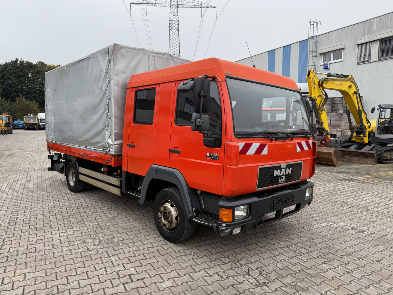 MAN 8.174 Pritsche+Plane+Ladebordwand DOKA L2000 - Camión lona: foto 3 MAN 8.174 Pritsche+Plane+Ladebordwand DOKA L2000 - Camión lona: foto 3