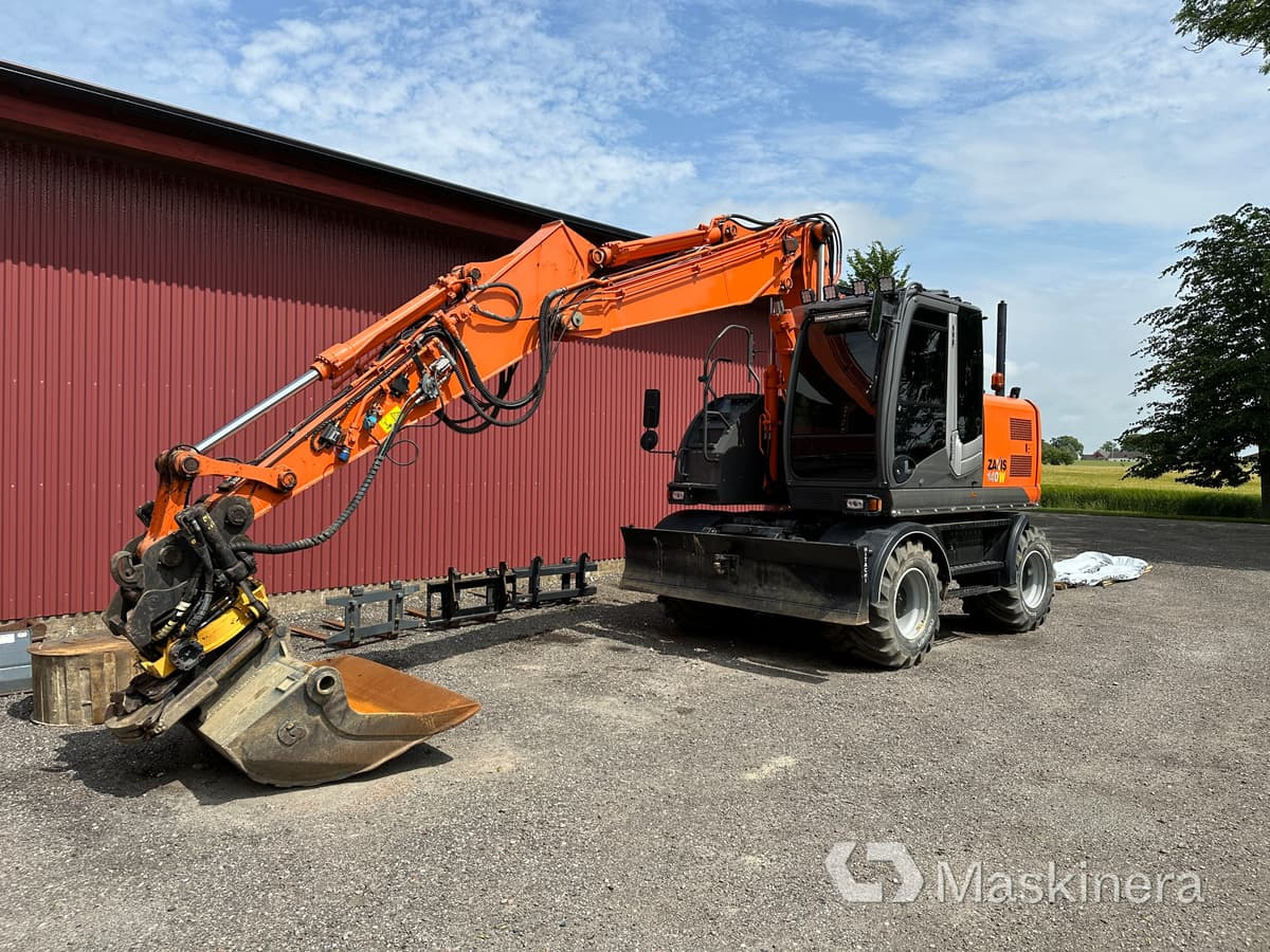 Hjulgrävare Hitachi ZX140W-3 - Excavadora de cadenas: foto 1 Hjulgrävare Hitachi ZX140W-3 - Excavadora de cadenas: foto 1