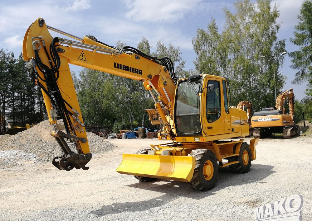Liebherr A 314 Litronic - Excavadora de ruedas: foto 1 Liebherr A 314 Litronic - Excavadora de ruedas: foto 1