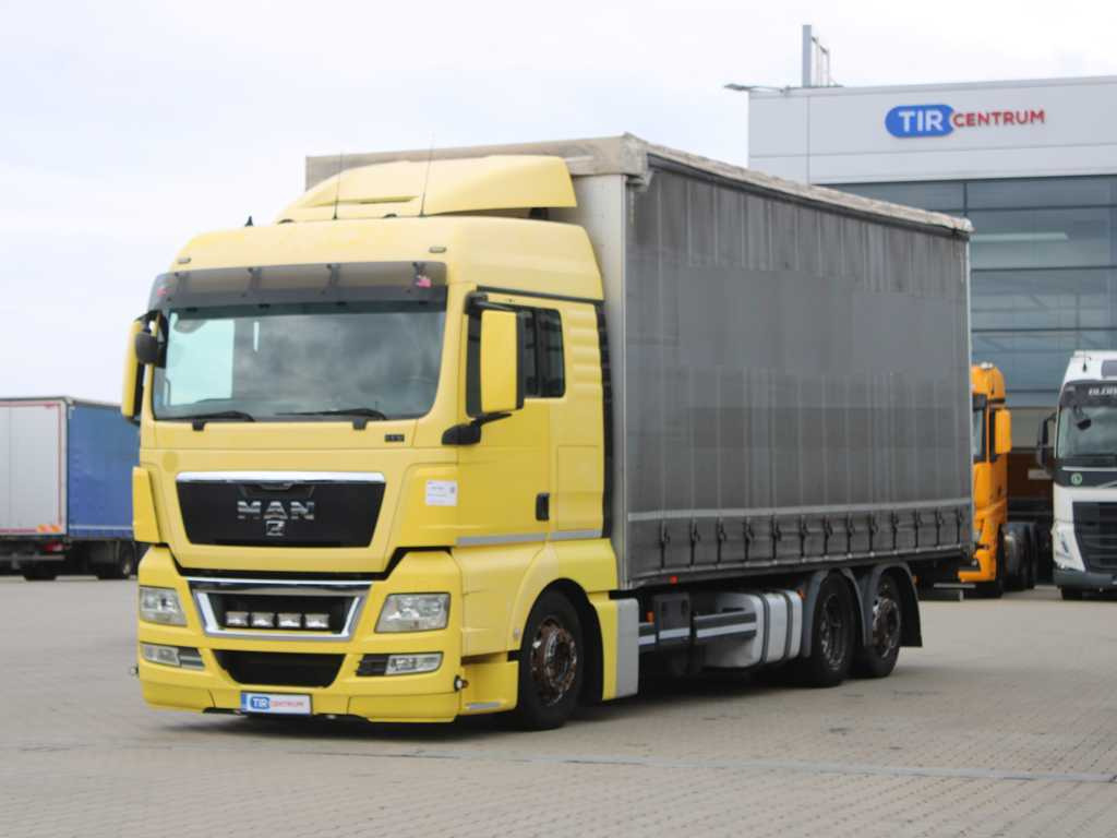 MAN TGX 24.440, EURO 5EEV, 6X2, AIR SUSPENSION - Camión lona: foto 1 MAN TGX 24.440, EURO 5EEV, 6X2, AIR SUSPENSION - Camión lona: foto 1