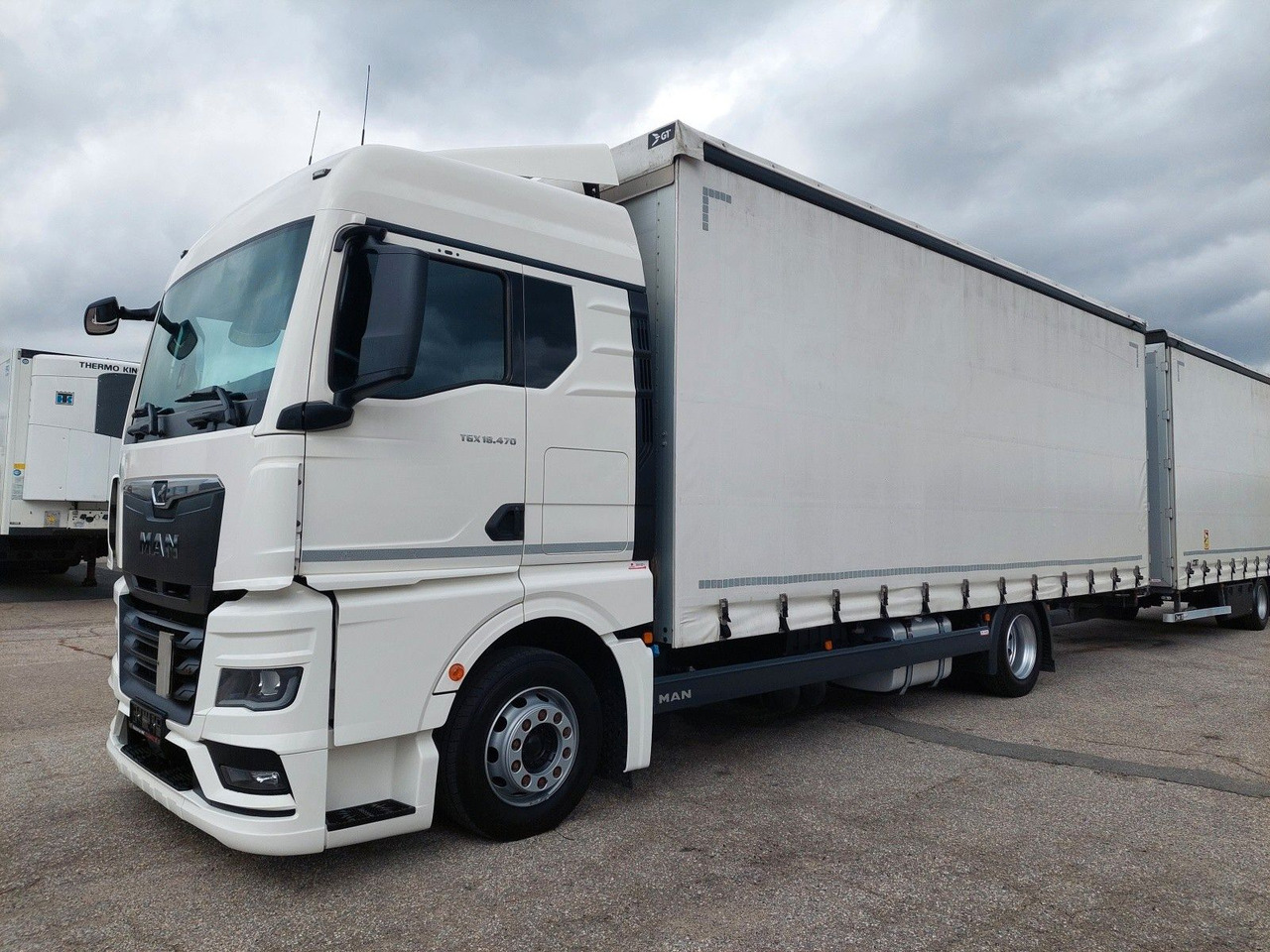 MAN TGX 18.470 LL + Gniotpol G-4080 120 m3 Durchbar - Camión lona: foto 5 MAN TGX 18.470 LL + Gniotpol G-4080 120 m3 Durchbar - Camión lona: foto 5