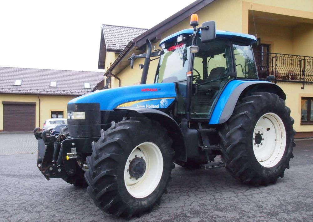 Ciągnik New Holland TM 140 2004 Przedni TUZ - Tractor: foto 3 Ciągnik New Holland TM 140 2004 Przedni TUZ - Tractor: foto 3