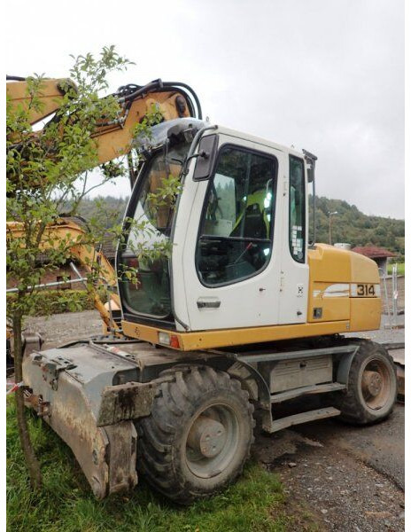 Liebherr A 314 - Excavadora de ruedas: foto 1 Liebherr A 314 - Excavadora de ruedas: foto 1