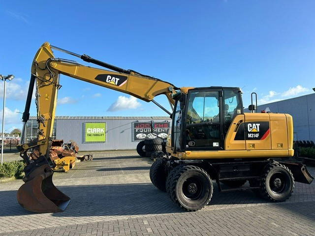 Caterpillar M314F - Excavadora de ruedas: foto 1 Caterpillar M314F - Excavadora de ruedas: foto 1
