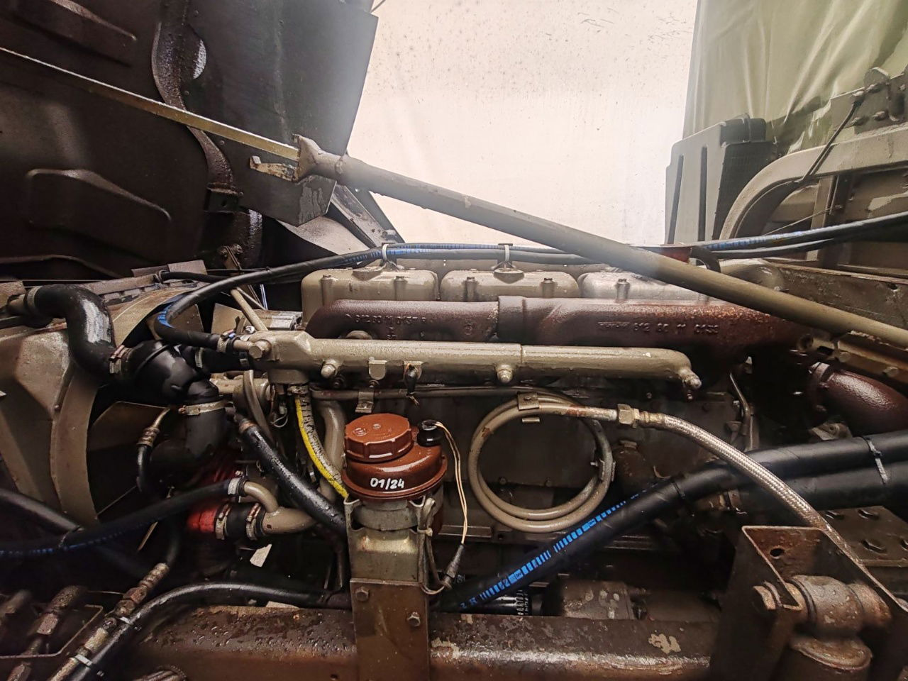 Camión lona Steyr 12M18 4X4 stake body - 62.000km: foto 13 Camión lona Steyr 12M18 4X4 stake body - 62.000km: foto 13