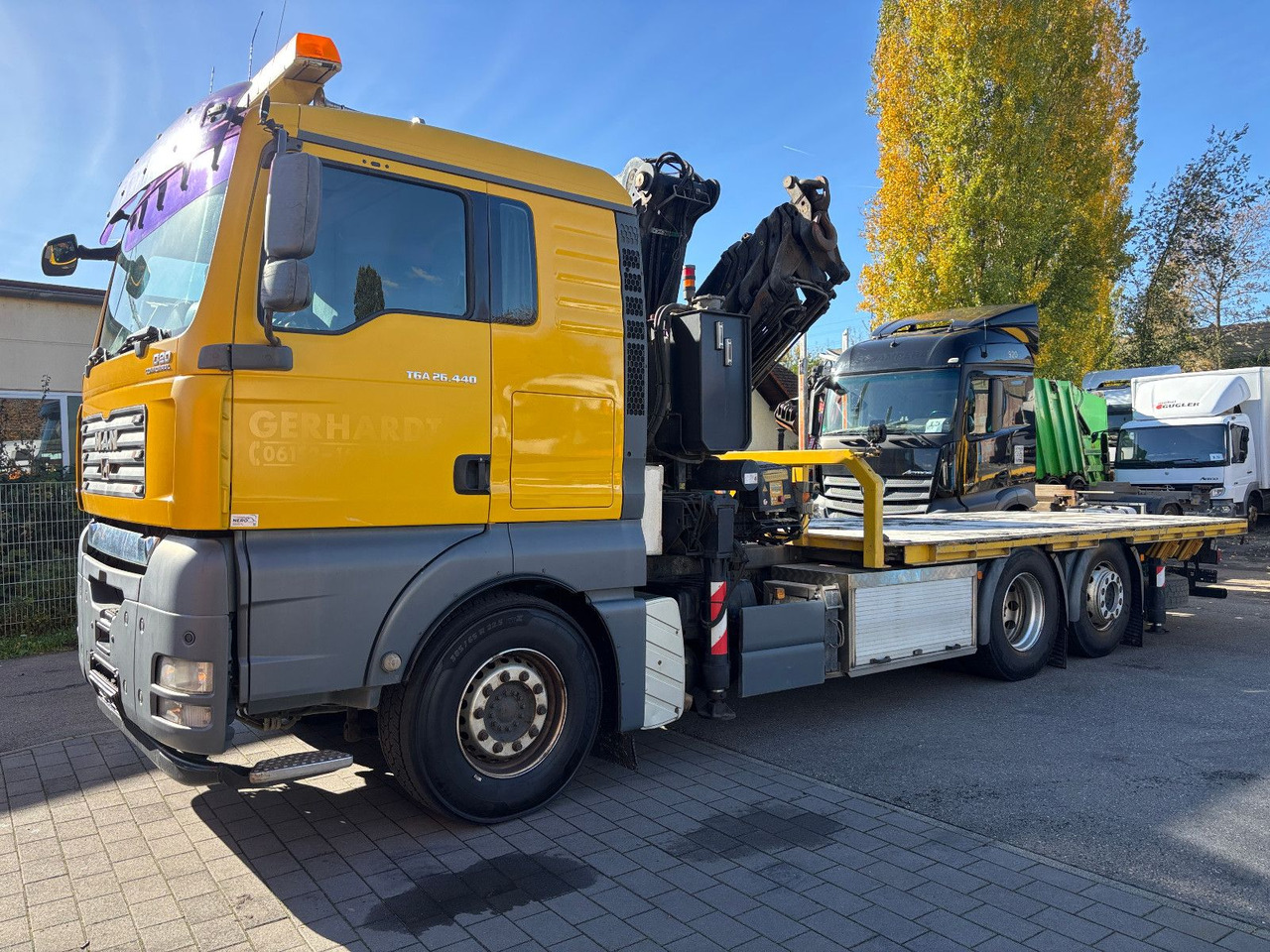 MAN TGA 26.440 FASSI F450AXP Containerauf./Lenkachse - Camión grúa: foto 1 MAN TGA 26.440 FASSI F450AXP Containerauf./Lenkachse - Camión grúa: foto 1
