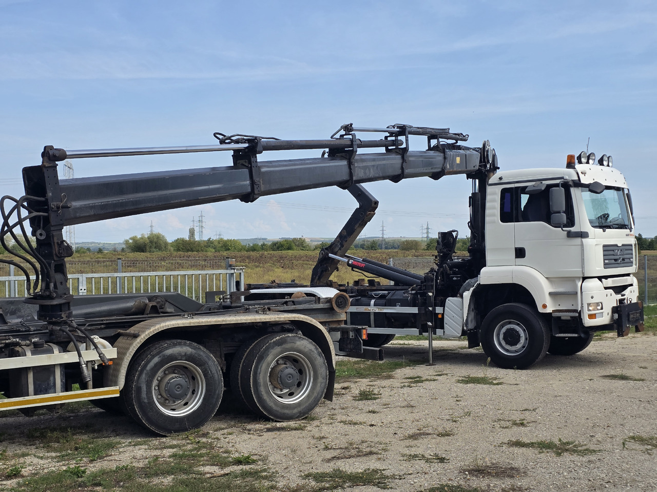 MAN TGA 26.440 6X6 / HOOK SYSTEM / HIAB 166D REMOTE - Camión multibasculante, Camión grúa: foto 4 MAN TGA 26.440 6X6 / HOOK SYSTEM / HIAB 166D REMOTE - Camión multibasculante, Camión grúa: foto 4