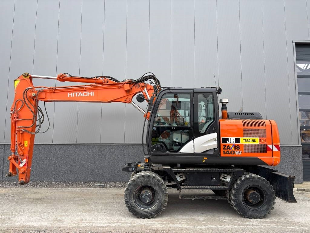 Hitachi ZX 140 W-5B - Excavadora de ruedas: foto 1 Hitachi ZX 140 W-5B - Excavadora de ruedas: foto 1