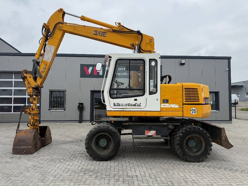 Liebherr A 312 - Excavadora de ruedas: foto 2 Liebherr A 312 - Excavadora de ruedas: foto 2