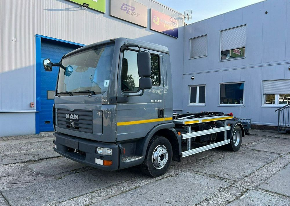 MAN TGL 12.180, hakowiec Janco/GP Lift - Camión de basura: foto 1 MAN TGL 12.180, hakowiec Janco/GP Lift - Camión de basura: foto 1