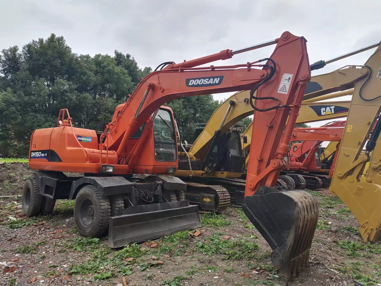 DOOSAN DH150W-7 - Excavadora de ruedas: foto 1 DOOSAN DH150W-7 - Excavadora de ruedas: foto 1