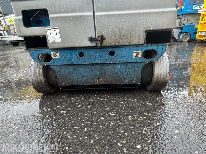 Plataforma elevadora 2006 Genie GR-12 5,5m mastelift: foto 18 Plataforma elevadora 2006 Genie GR-12 5,5m mastelift: foto 18