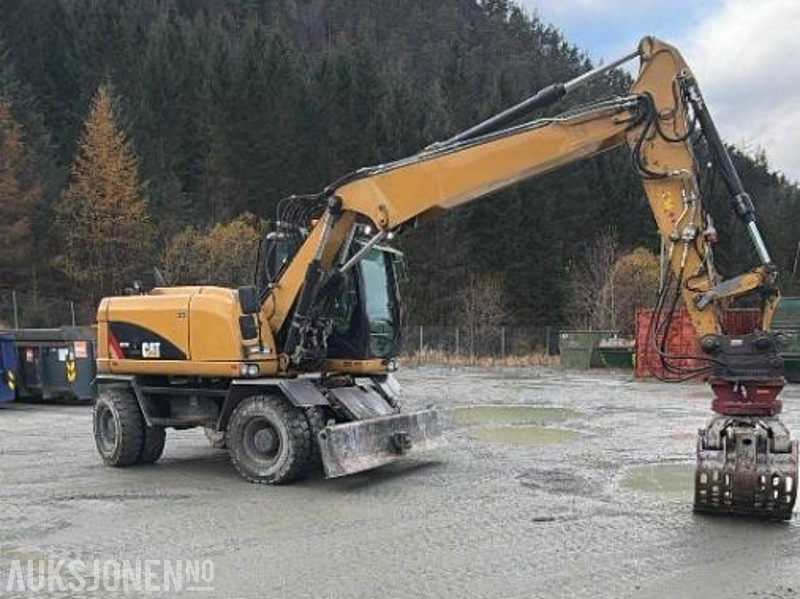 2013 Cat M313D med skjær kun 9.700 arbeidstimer! Indexator Rototilt, NY SERTIFISERT!, NYE DEKK! GRAVESKUFFE + PUSSESKUFFE TOP STAND! - Excavadora: foto 2 2013 Cat M313D med skjær kun 9.700 arbeidstimer! Indexator Rototilt, NY SERTIFISERT!, NYE DEKK! GRAVESKUFFE + PUSSESKUFFE TOP STAND! - Excavadora: foto 2
