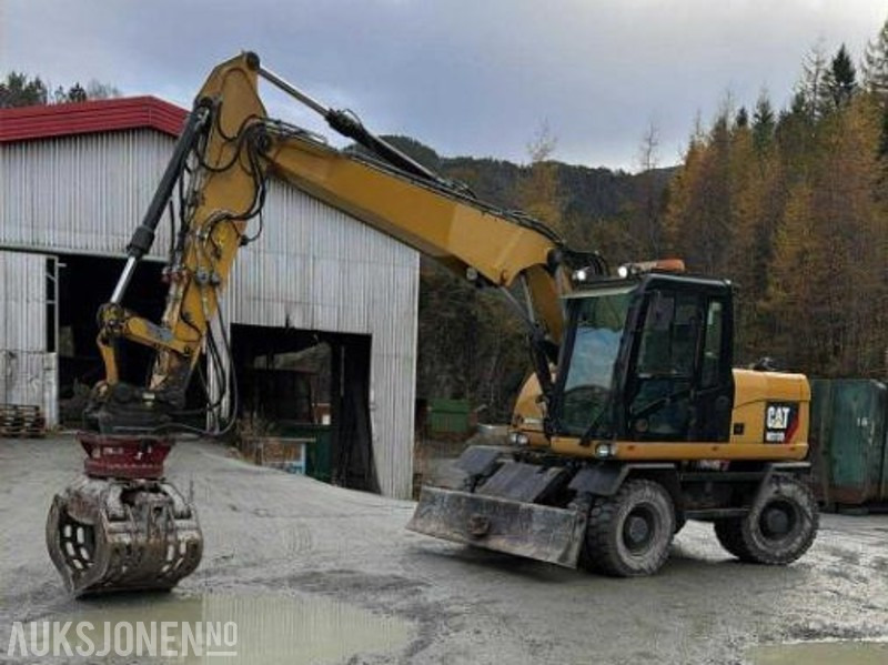 2013 Cat M313D med skjær kun 9.700 arbeidstimer! Indexator Rototilt, NY SERTIFISERT!, NYE DEKK! GRAVESKUFFE + PUSSESKUFFE TOP STAND! - Excavadora: foto 1 2013 Cat M313D med skjær kun 9.700 arbeidstimer! Indexator Rototilt, NY SERTIFISERT!, NYE DEKK! GRAVESKUFFE + PUSSESKUFFE TOP STAND! - Excavadora: foto 1
