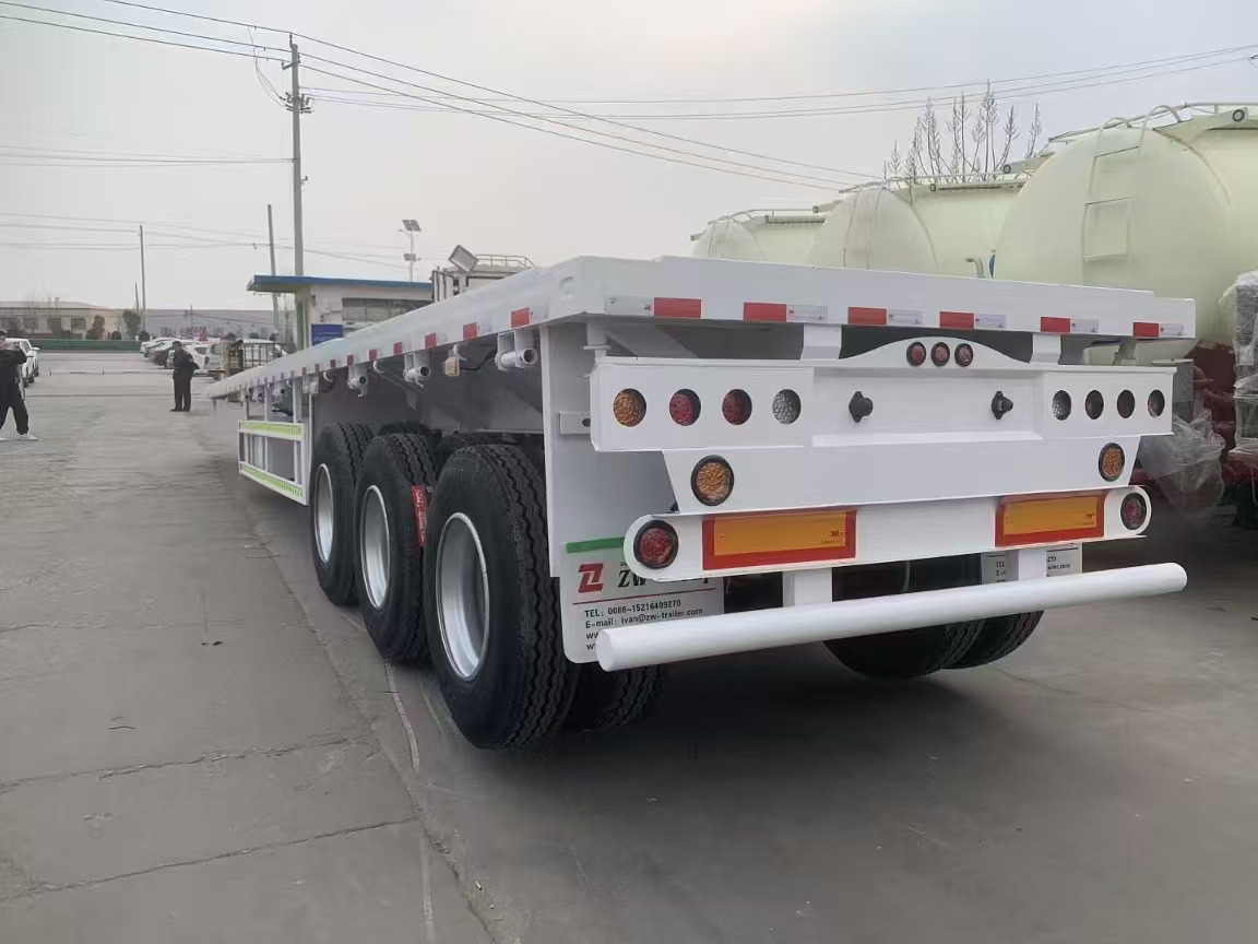 Semirremolque góndola rebajadas nuevo ZHICHENG Semni Flat Bed Low Bed Floater with 3 Axles 4 Axles New or Used 12M 13.75M In High Quality: foto 23 Semirremolque góndola rebajadas nuevo ZHICHENG Semni Flat Bed Low Bed Floater with 3 Axles 4 Axles New or Used 12M 13.75M In High Quality: foto 23