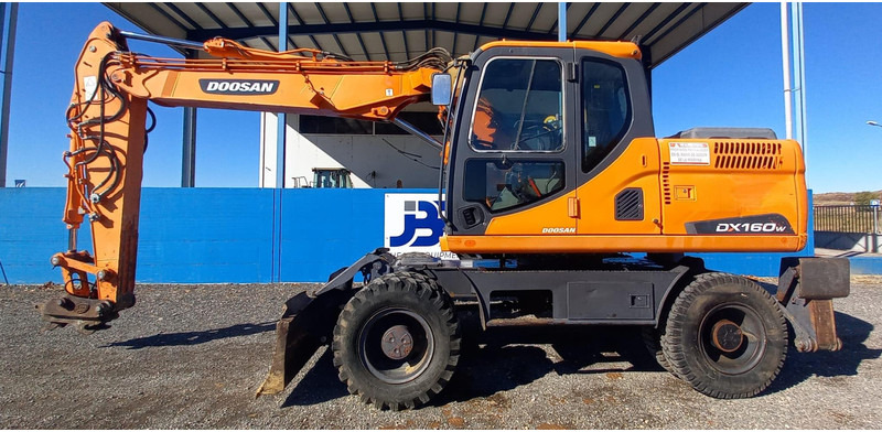 Doosan DX140W-3 *coming soon* - Excavadora de ruedas: foto 1 Doosan DX140W-3 *coming soon* - Excavadora de ruedas: foto 1