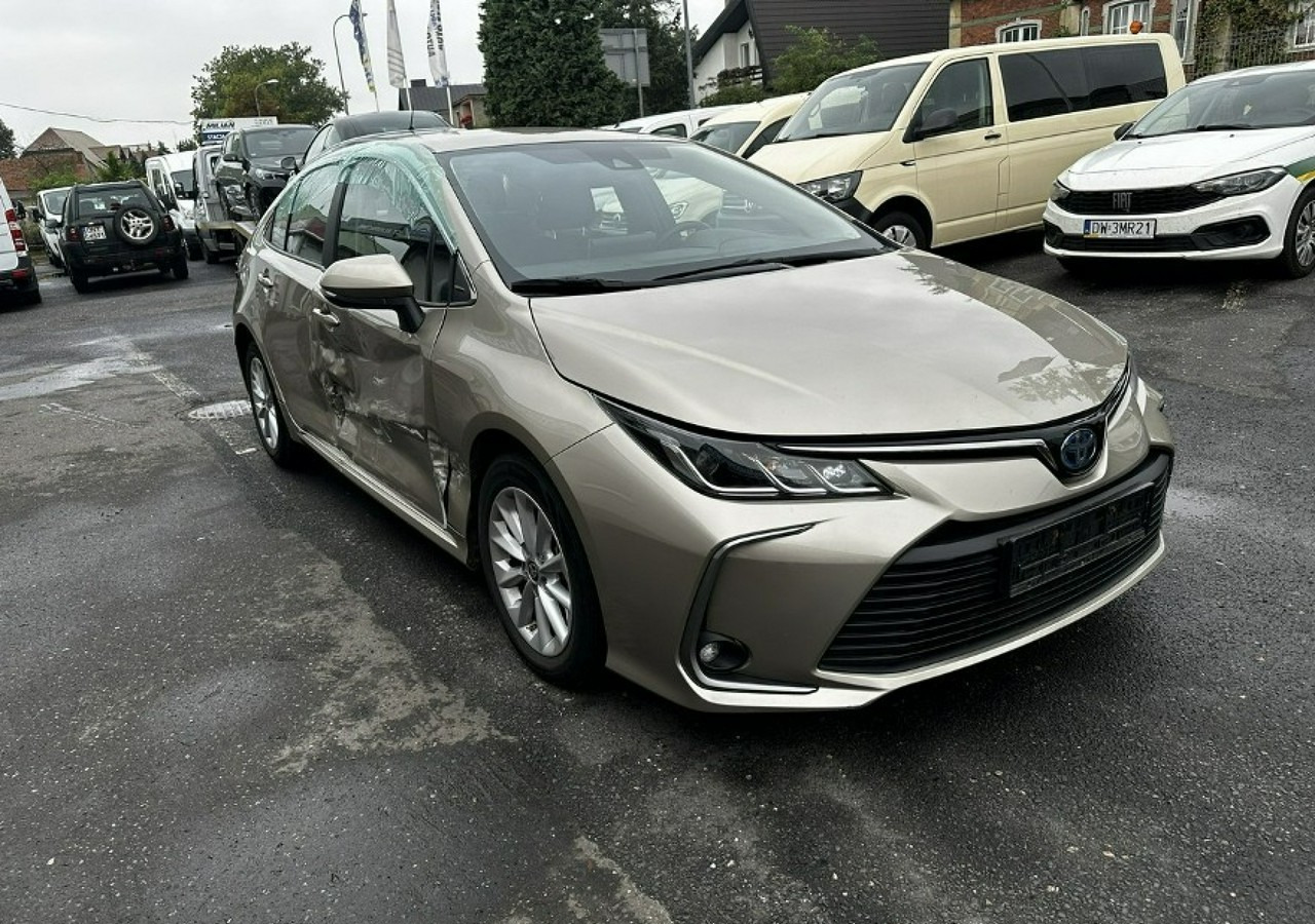 Toyota Corolla XII Corolla Sedan 1.8 Hybrid 98KM Comfort Salon PL 2022 - Berlina: foto 1 Toyota Corolla XII Corolla Sedan 1.8 Hybrid 98KM Comfort Salon PL 2022 - Berlina: foto 1