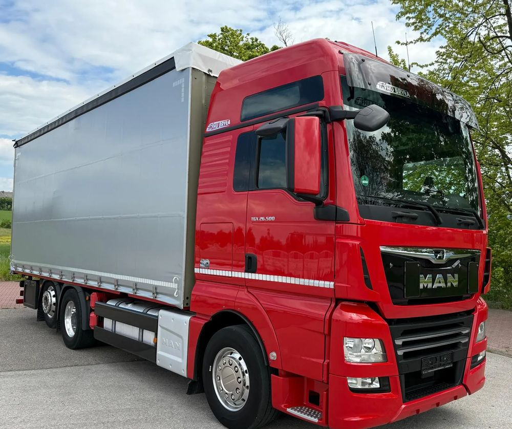 MAN TGX 26.500 / LIFT / 6X2 / KLIMA POSTOJOWA / 18PALET / E6 / FIRANKA / 18 TON ŁADOWNOŚĆ / WINDA / NISKI PRZEBIEG / JEDEN WŁAŚCICIEL / PODWIESZANA OŚ - Camión lona: foto 2 MAN TGX 26.500 / LIFT / 6X2 / KLIMA POSTOJOWA / 18PALET / E6 / FIRANKA / 18 TON ŁADOWNOŚĆ / WINDA / NISKI PRZEBIEG / JEDEN WŁAŚCICIEL / PODWIESZANA OŚ - Camión lona: foto 2