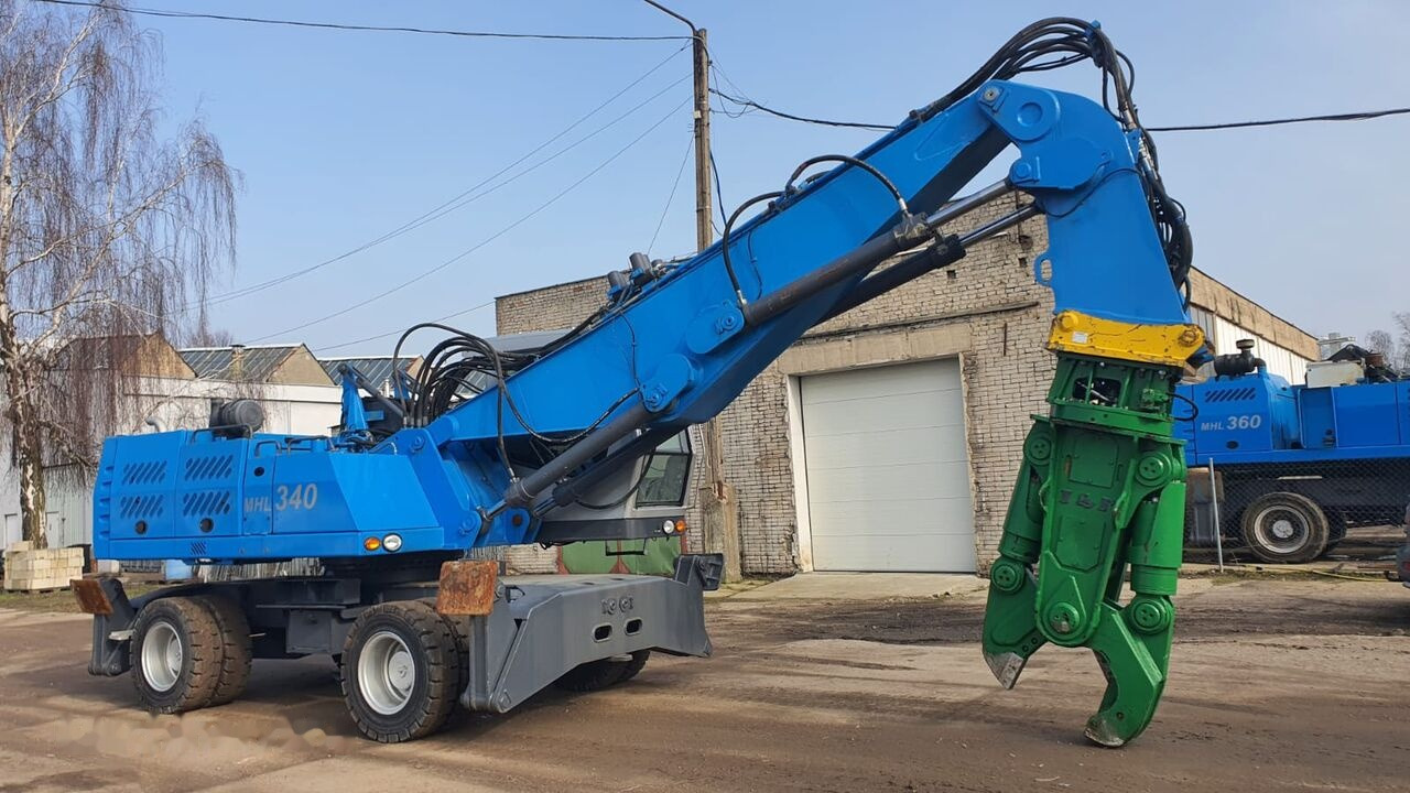 Fuchs MHL 340D FQC + LST 3to shear - Manipulador de materiales: foto 5 Fuchs MHL 340D FQC + LST 3to shear - Manipulador de materiales: foto 5
