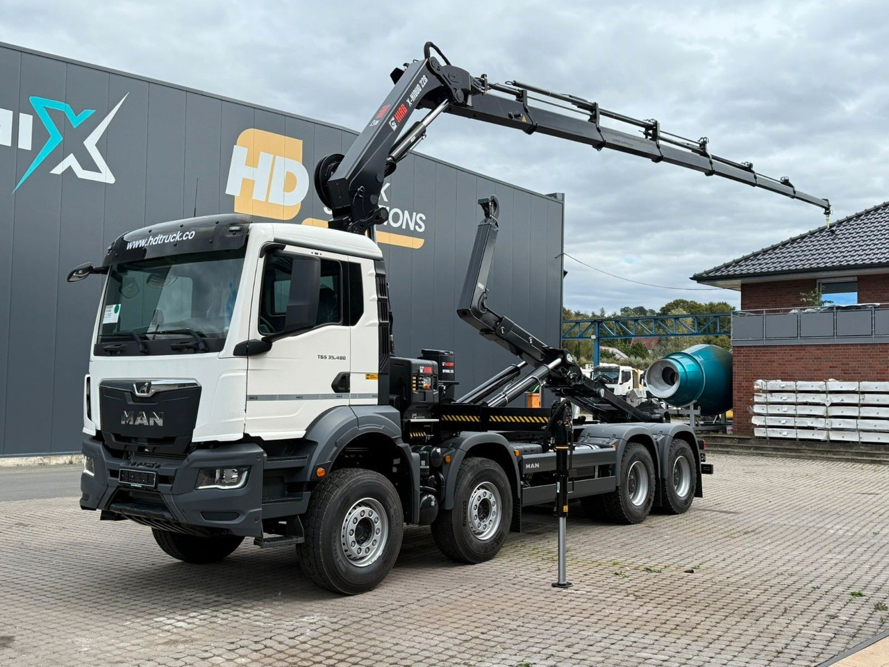 MAN TGS 35.480 8x4 Abrollkipper + Kran HIAB 228-6 - Camión multibasculante, Camión grúa: foto 1 MAN TGS 35.480 8x4 Abrollkipper + Kran HIAB 228-6 - Camión multibasculante, Camión grúa: foto 1