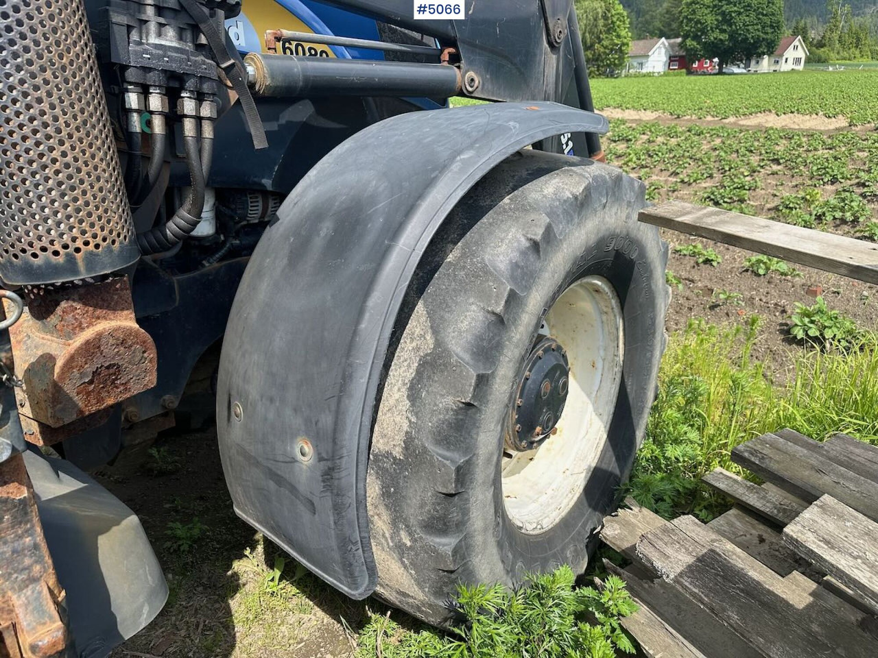 Tractor 2011 New Holland T6080 w/ trima +5.1p: foto 19 Tractor 2011 New Holland T6080 w/ trima +5.1p: foto 19