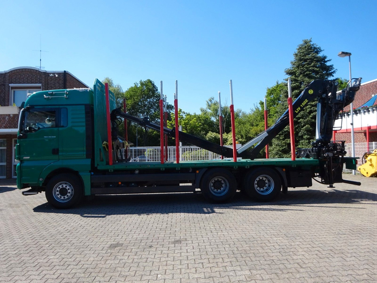 MAN 33.560 TGX mit TAJFUN L150Z Holzladekran 6x4 - Camión forestal, Camión grúa: foto 3 MAN 33.560 TGX mit TAJFUN L150Z Holzladekran 6x4 - Camión forestal, Camión grúa: foto 3
