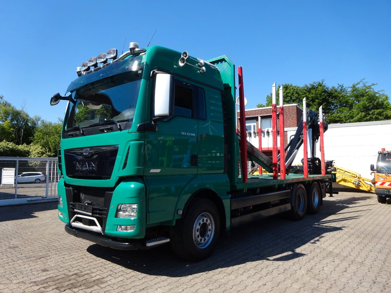 MAN 33.560 TGX mit TAJFUN L150Z Holzladekran 6x4 - Camión forestal, Camión grúa: foto 2 MAN 33.560 TGX mit TAJFUN L150Z Holzladekran 6x4 - Camión forestal, Camión grúa: foto 2