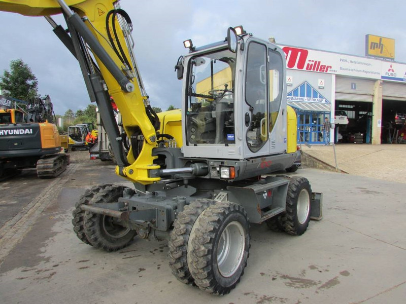 WACKER NEUSON EW 100 Mobilbagger Klima / AC / 59.500 EUR - Excavadora de ruedas: foto 2 WACKER NEUSON EW 100 Mobilbagger Klima / AC / 59.500 EUR - Excavadora de ruedas: foto 2