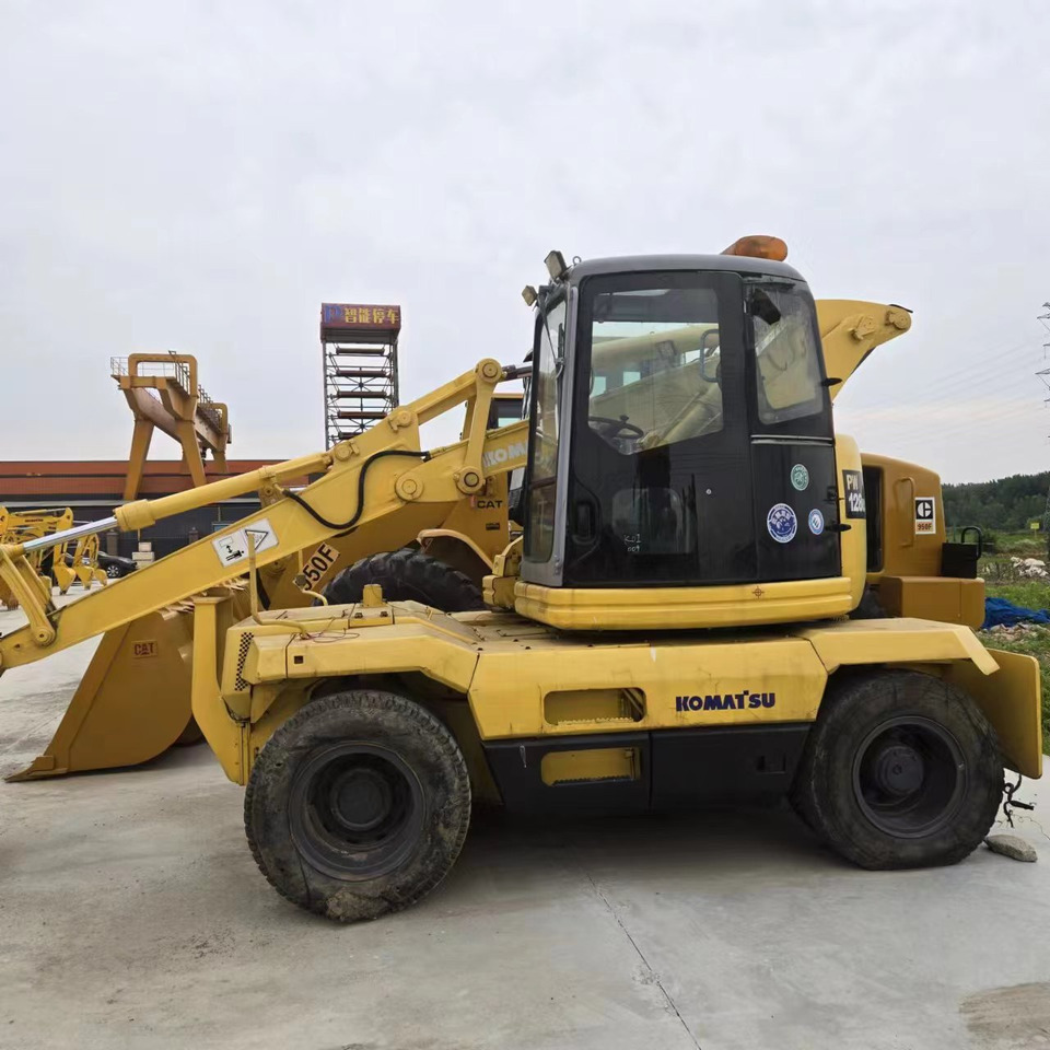KOMATSU PC128US - Excavadora de ruedas: foto 2 KOMATSU PC128US - Excavadora de ruedas: foto 2