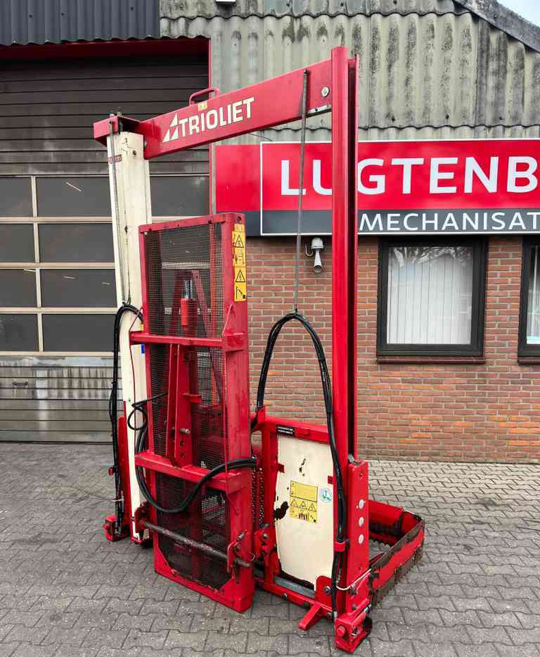Trioliet TU195 Kuilvoersnijder kuilsnijder hefmast voermachines - Equipo para silos: foto 1 Trioliet TU195 Kuilvoersnijder kuilsnijder hefmast voermachines - Equipo para silos: foto 1