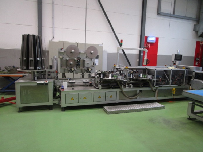 BECHER ETIKETTIERANLAGE SCHLEUTER GU 4S 6 - Máquina de embalaje: foto 2 BECHER ETIKETTIERANLAGE SCHLEUTER GU 4S 6 - Máquina de embalaje: foto 2