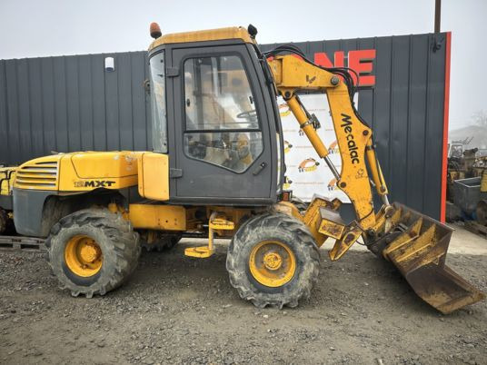 Mecalac 12MXT à 14900 Euros HT - Excavadora de ruedas: foto 1 Mecalac 12MXT à 14900 Euros HT - Excavadora de ruedas: foto 1