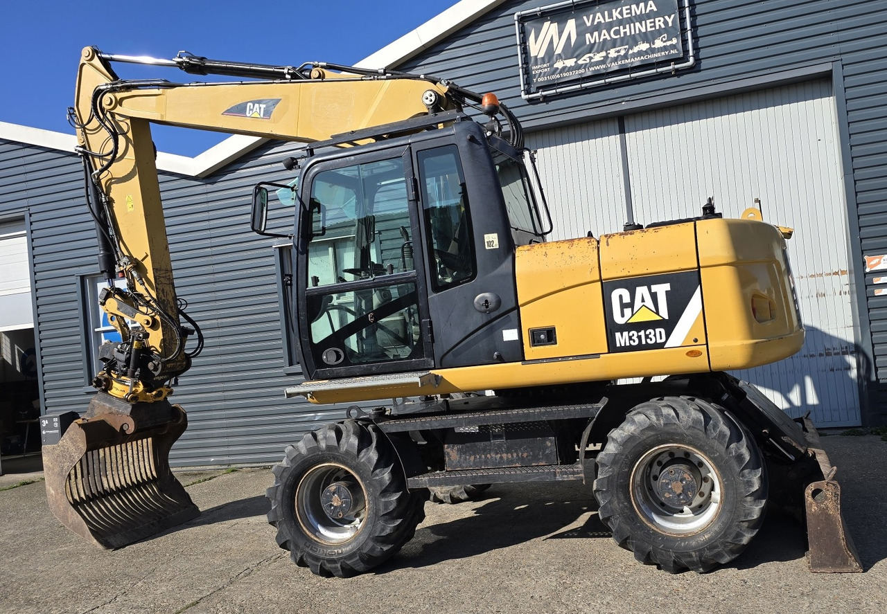 Excavadora de ruedas CATERPILLAR M313D: foto 8