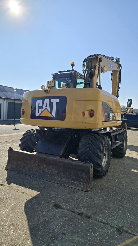 Excavadora de ruedas CATERPILLAR M313D: foto 6