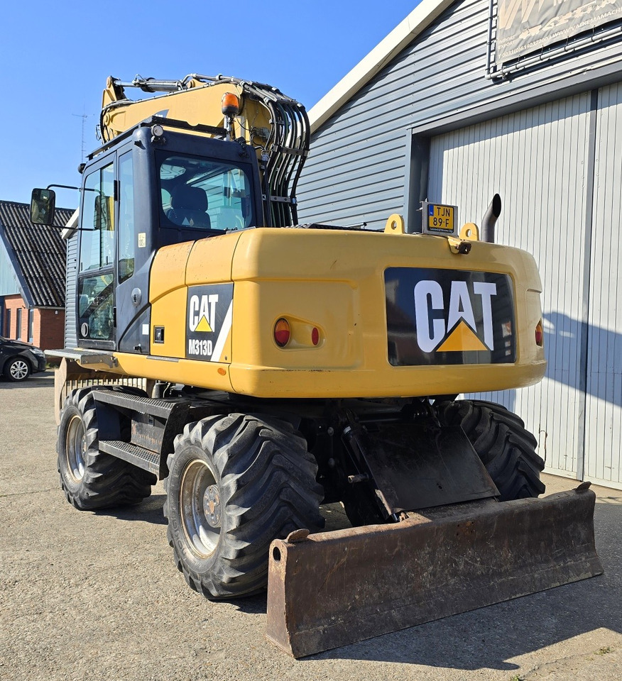 Excavadora de ruedas CATERPILLAR M313D: foto 7