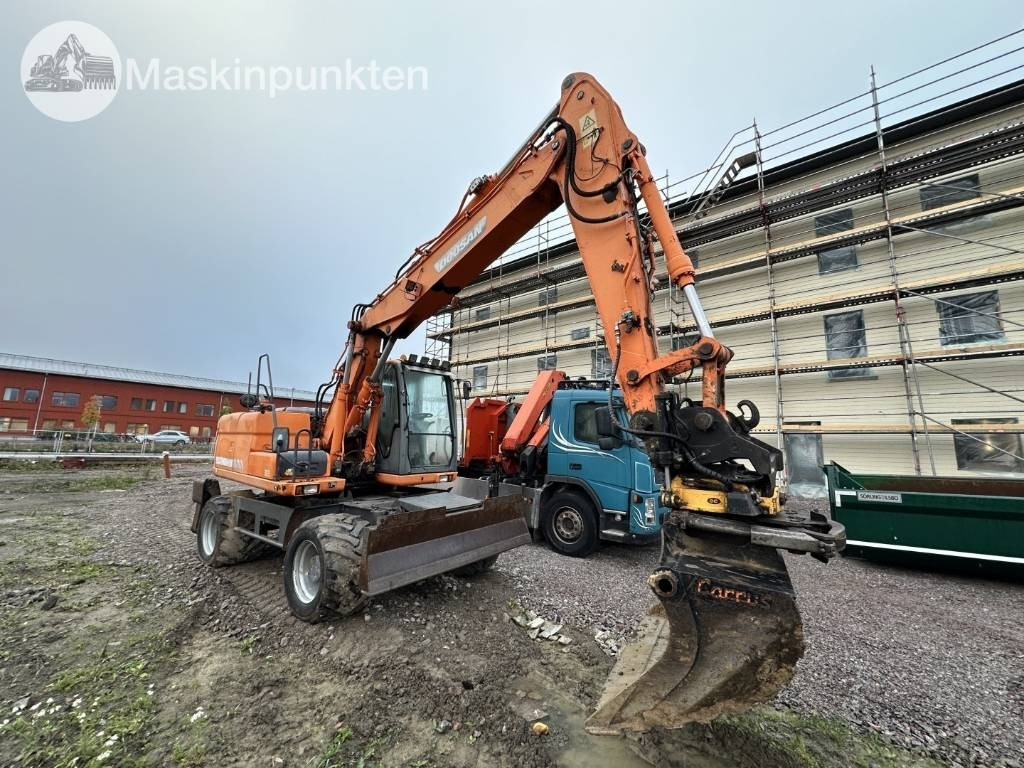 Doosan DX 140 W med vagn och redskap  - Excavadora de ruedas: foto 2 Doosan DX 140 W med vagn och redskap  - Excavadora de ruedas: foto 2